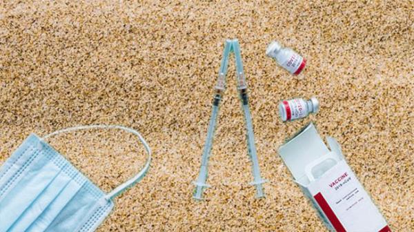 COVID Vaccine on Sand